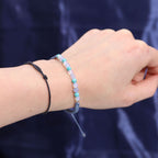 Świeca ZODIAK z kryształami + bransoletka z kamieni - RYBY